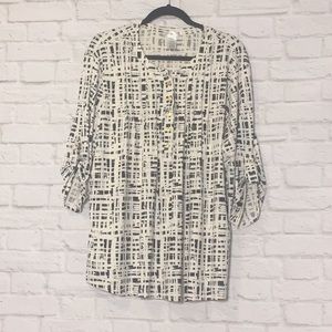 Off White blouse with black design. 1X